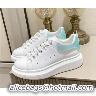 Luxury Alexander McQueen Oversized Sneakers in Silky Calfskin and Rubber Heel Tab White/Light Green 1225056