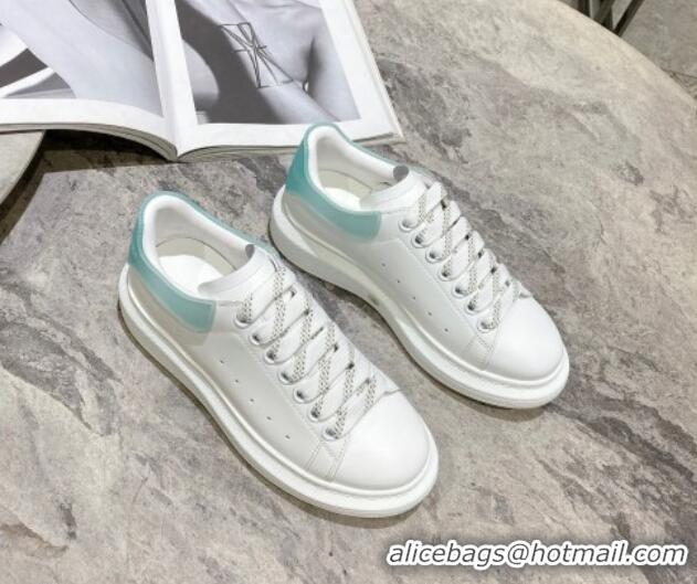 Luxury Alexander McQueen Oversized Sneakers in Silky Calfskin and Rubber Heel Tab White/Light Green 1225056