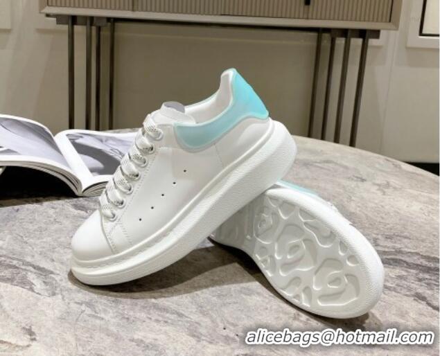 Luxury Alexander McQueen Oversized Sneakers in Silky Calfskin and Rubber Heel Tab White/Light Green 1225056