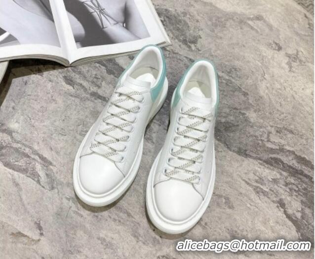 Luxury Alexander McQueen Oversized Sneakers in Silky Calfskin and Rubber Heel Tab White/Light Green 1225056