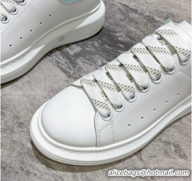 Luxury Alexander McQueen Oversized Sneakers in Silky Calfskin and Rubber Heel Tab White/Light Green 1225056