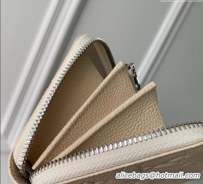 Pretty Style Louis Vuitton Zippy Wallet in Cream Beige Supple Grained Leather M12680 2024 LV Ski Collection