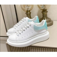 Luxury Alexander McQueen Oversized Sneakers in Silky Calfskin and Rubber Heel Tab White/Light Green 1225056