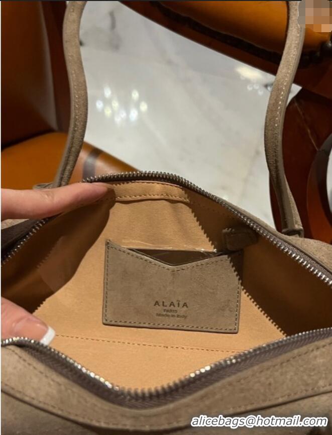 Shop Promotional Alaia Le Tecket Medium Long Shoulder bag in Suede 0808 Beige 2024