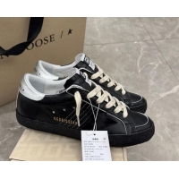 Good Looking Golden Goose Women's Super-Star Sneakers in black leather with black star and silver heel tab 0221001